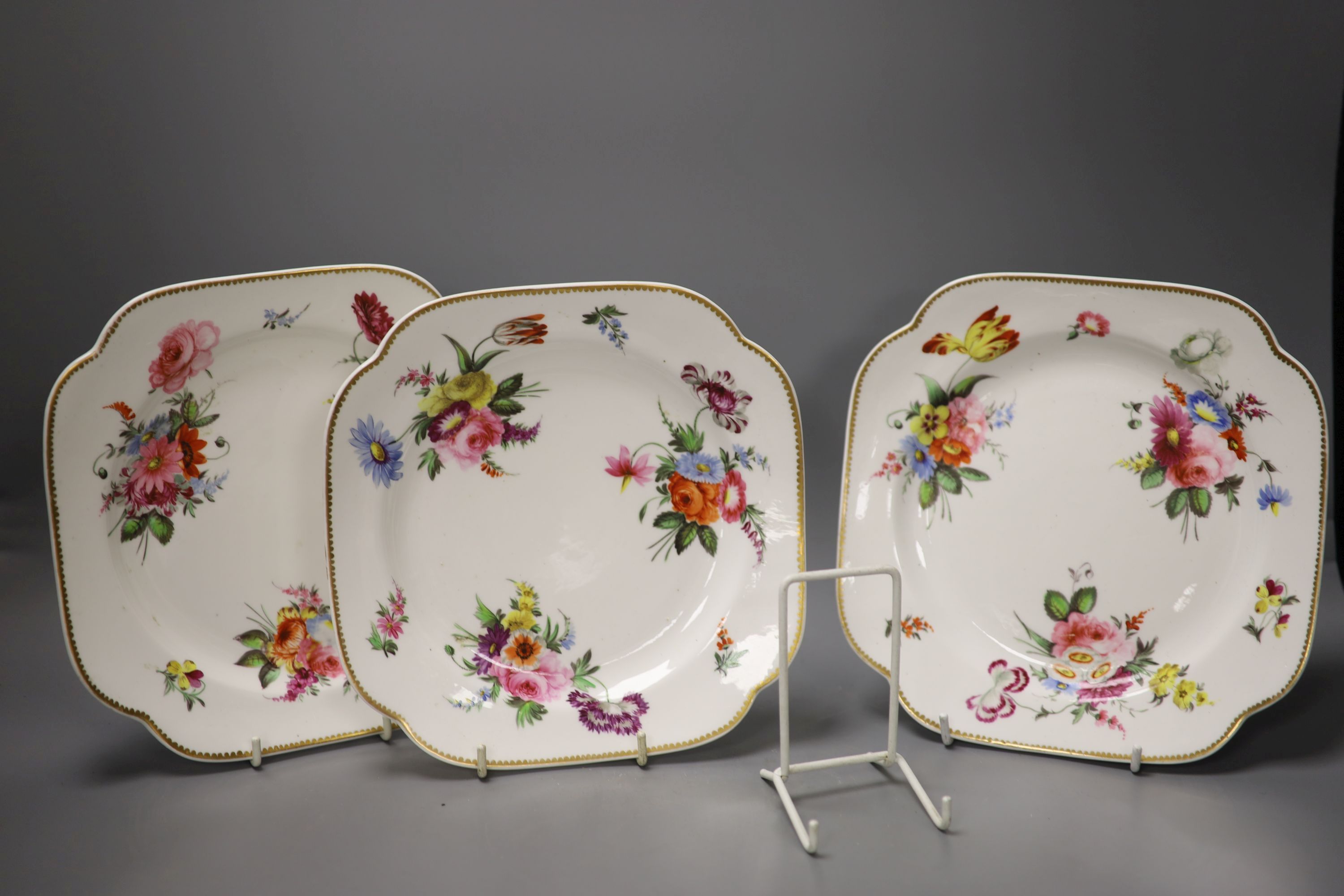 A set of three Spode square dishes each painted with three floral bouquets and three sprigs,